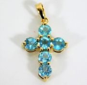 A 9ct gold cross set with topaz 1.4g