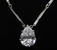 A platinum necklace set with pear shaped diamond o