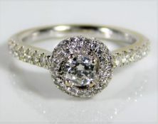 An 18ct white gold Vera Wang "Love Ring" ring set with 0.7ct diamonds 4.8g size M/N