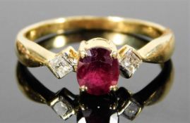 An 18ct gold ring set with 0.85ct ruby & 0.13ct diamond 2.9g size O/P