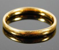 A 22ct gold wedding band 3.4g size Q/R