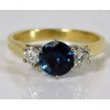 An 18ct gold ring set with sapphire & approx. 0.3c