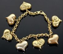 An 18ct three colour gold heart bracelet 8in 29.6g