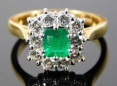 An 18ct gold ring set with emerald & approx. 0.9ct