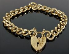 A 9ct gold bracelet with padlock clasp 6.5in long