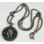 A silver chain with commemorative medallion 1977 2