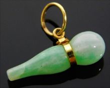 A small jade pendant with yellow metal mount 20mm
