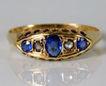 An antique 18ct gold ring set with sapphire & diam