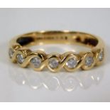 A 9ct gold half eternity ring set with approx. 0.3