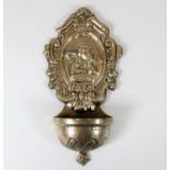 An Italian silver wall sconce with embossed decor
