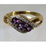 A 9ct gold ring set with amethyst & diamond 2.8g s