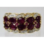 A 9ct gold ring set with ruby & diamond 4.3g size