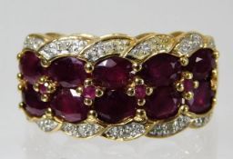 A 9ct gold ring set with ruby & diamond 4.3g size