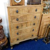 A decorative utility chest of drawers 44.5in high