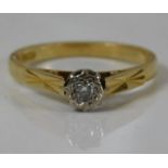 An 18ct gold ring set with illusion set diamond 2.