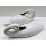 Two decorative carved swan figures
