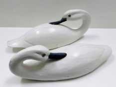 Two decorative carved swan figures