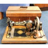 A cased Jones sewing machine