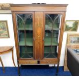 A c.1900 glass fronted inlaid mahogany display cab