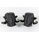 A pair of bronze style rams head wall hangers, eac