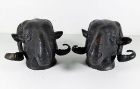 A pair of bronze style rams head wall hangers, eac