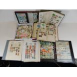 Six albums of world stamps & a box of loose