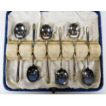 A cased set of six small silver tea spoons by Jame