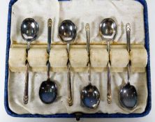 A cased set of six small silver tea spoons by Jame