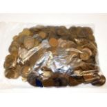 An A4 bag of copper coinage