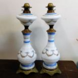 A pair of 19thC. glass oil lamps a/f