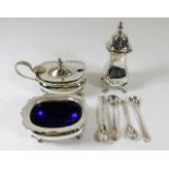 A silver plated cruet set