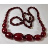 A vintage cherry amber style necklace 64g