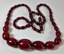 A vintage cherry amber style necklace 64g