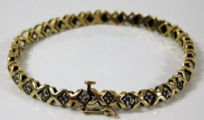 A 9ct gold bracelet set with diamond 10g, 7.5in lo