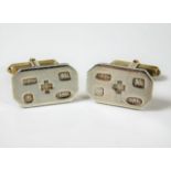 A pair of silver millennium hallmarked cufflinks 1