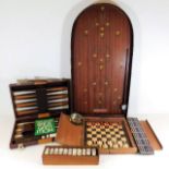 A vintage set of dominoes twinned with a bagatelle, a vintage cane fly rod & other games
