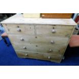 A Victorian striped pine chest of drawers