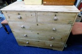 A Victorian striped pine chest of drawers