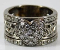 An 18ct white gold ring by Garrard set with approx. 1.5ct diamonds 12.4g size P/Q