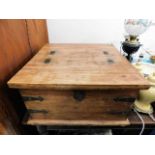 A 20thC. coffee table trunk 31in square x 16.5in h