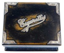 A vintage cigarette box with hallmarked silver fit