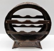 A circular wooden wine rack