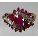 A 9ct gold ring set with diamond & ruby 2.9g size