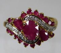 A 9ct gold ring set with diamond & ruby 2.9g size