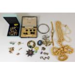 A quantity of costume jewellery item including a V