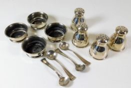 Four silver salts with spoons twinned with four si