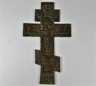 A 19thC. bronze crucifix with possibly Hebrew insc