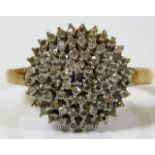 A 9ct gold diamond cluster ring 4.4g size S