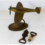 A brass desk spitfire & two vintage bottle openers