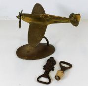 A brass desk spitfire & two vintage bottle openers